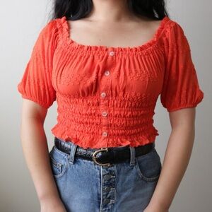 Orange ruched puff sleeve top